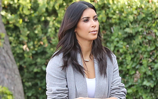 PHOTOS: Kim Kardashian Debuts Handbag Painted by North West