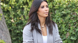 PHOTOS: Kim Kardashian Debuts Handbag Painted by North West
