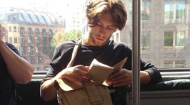 'Hot Dudes Reading' is What You Need on Your Commute
