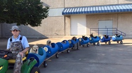 Man Builds 'Dog Train' to Take Rescued Pups Out On Little Adventures