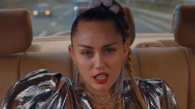 Miley Cyrus drops bad arse video clip for her brand new single 'Nothing Breaks Like a Heart'